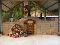 A bamboo charcoal earthen kiln. The kiln needs approximately 250 kg of acacia fuelwood for each firing.